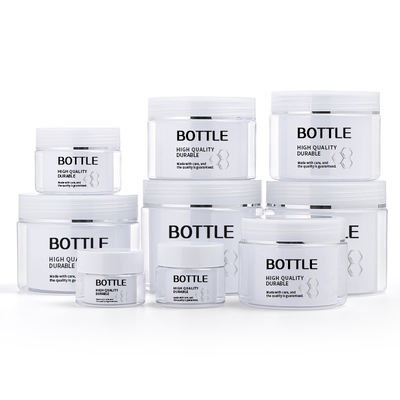Os frascos da parede enfrentam o cosmético do frasco do creme do plástico da composição das loções dos cuidados com a pele do cabelo da mão