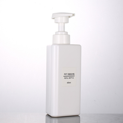 A forma por atacado do triângulo de 100ml 200ml 300ml recicla garrafas mal ventiladas do champô da bomba 500ml do preto plástico do recipiente da loção do animal de estimação