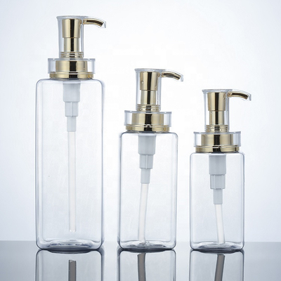 Garrafa clara do champô do plástico da loção dos homens vazios luxuosos do condicionador Packaging16oz do hotel de 300ml 400ml 500ml com bomba do ouro