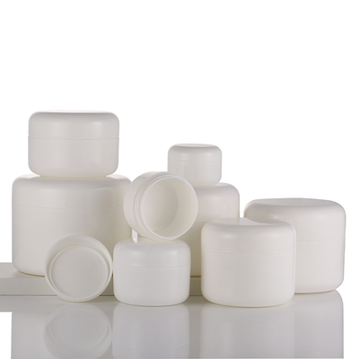 O frasco de empacotamento de creme branco redondo, corpo desnata os frascos 50g cosméticos